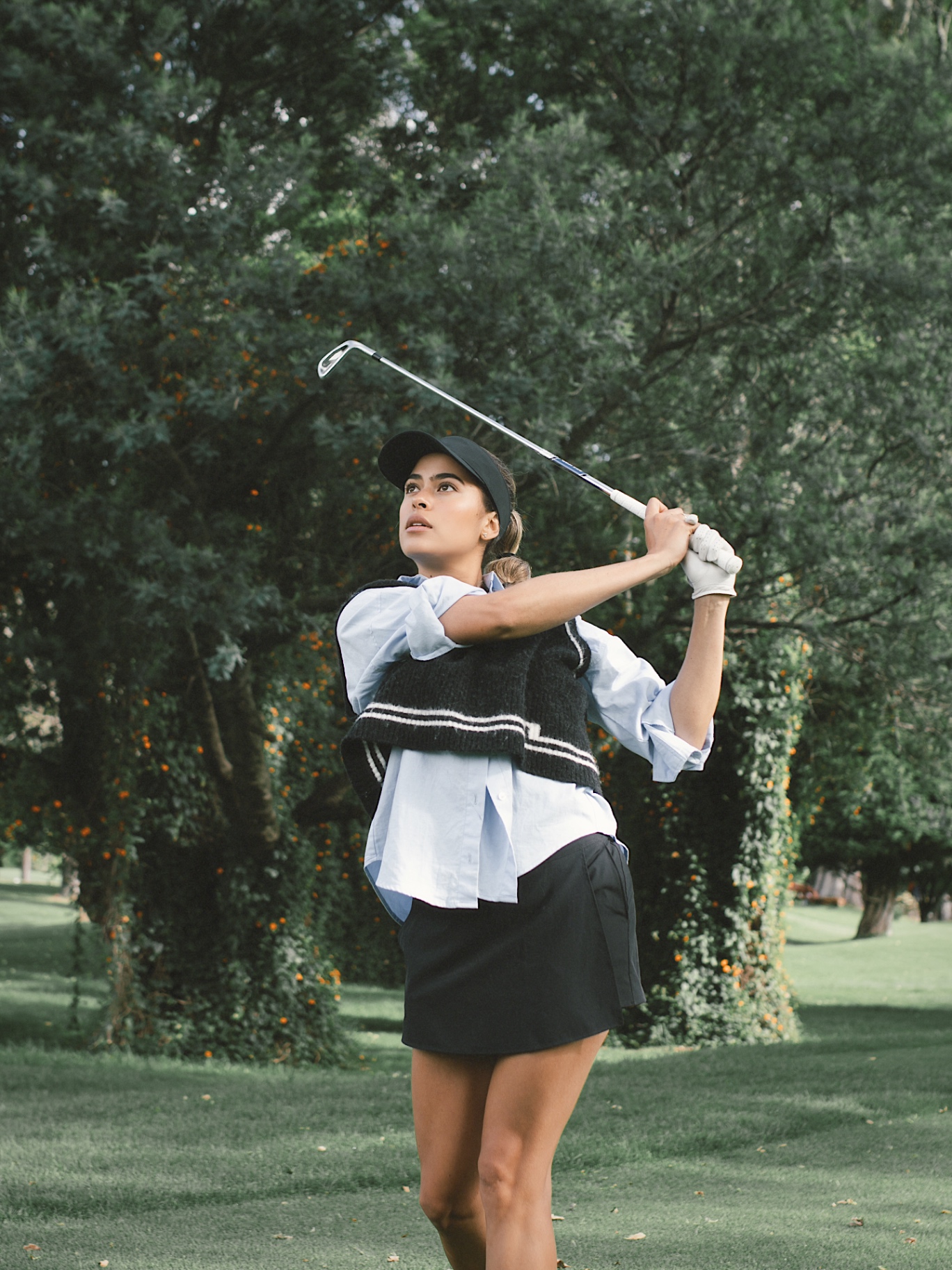 María Rodríguez jugando golf